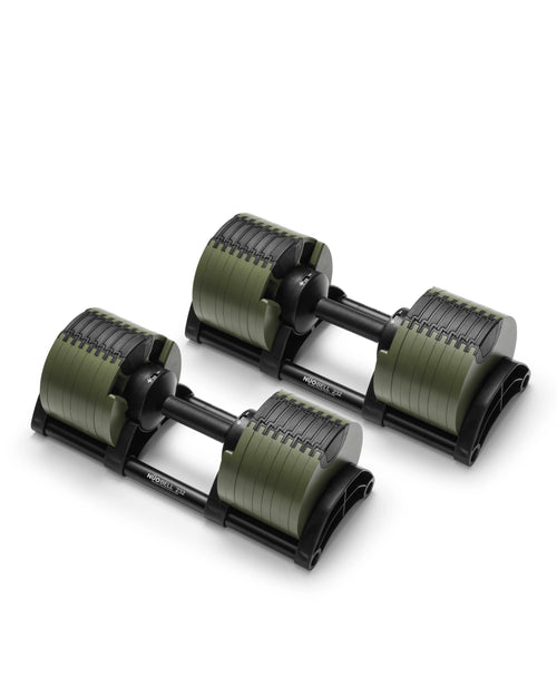 NÜOBELL 232 adjustable dumbbell in Green, modern and compact for home gyms, offering quick weight adjustment and premium quality for effective strength training.