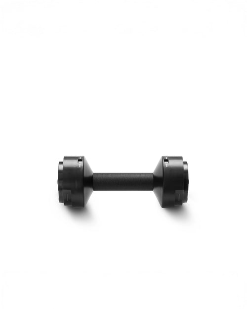 NÜOBELL replacement handle in Black (KG), sturdy and ergonomic, made for adjustable dumbbells to deliver a secure grip and reliable performance in home gyms.