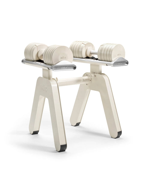 NÜOBELL S Pylon Floor Stand in sand color – sturdy floor stand designed for NÜOBELL S adjustable dumbbells, offering secure storage and a modern, minimalist look for home gyms.