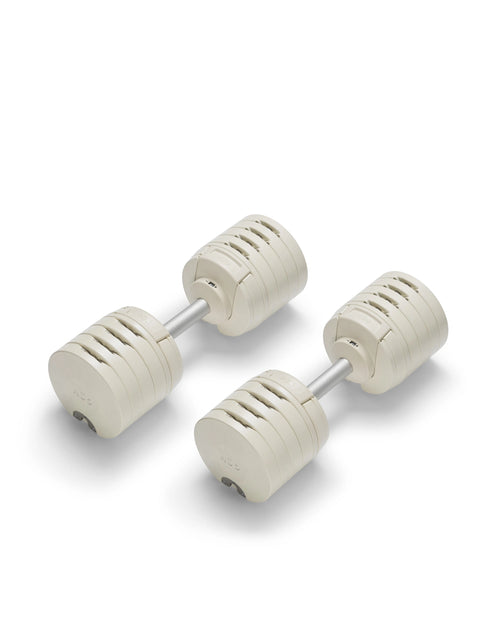 NÜOBELL S 240 adjustable dumbbell in Sand color – compact, versatile dumbbell designed for space-saving strength training at home, featuring a modern Swedish design.
