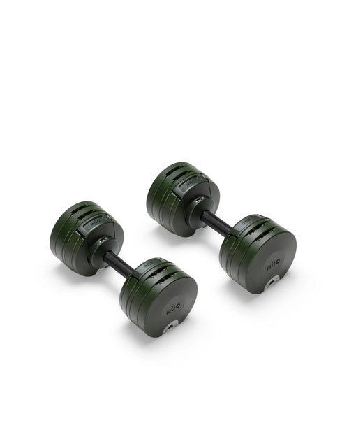 NÜOBELL S 224 Forest adjustable dumbbell in green, compact design for home gym strength training.