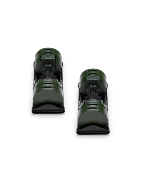 NÜOBELL S 224 Forest adjustable dumbbell in green, compact design for home gym strength training.
