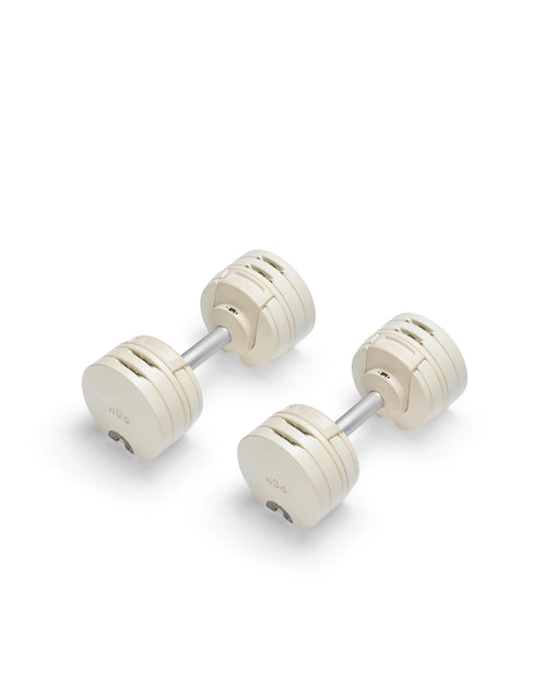 NÜOBELL S 224 Sand adjustable dumbbell in beige, space-saving design for home gym strength workouts.