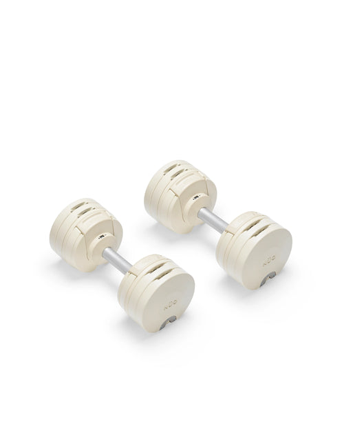 NÜOBELL S 224 Sand adjustable dumbbell in beige, space-saving design for home gym strength workouts.