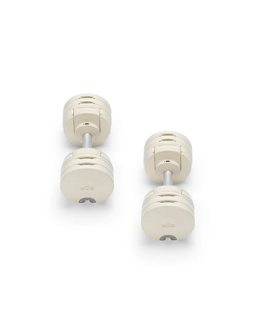 NÜOBELL S 224 Sand adjustable dumbbell in beige, space-saving design for home gym strength workouts.